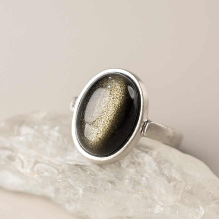 Anillo de riqueza ajustable de obsidiana con brillo dorado y plata de ley 925 natural de Buddha Stones