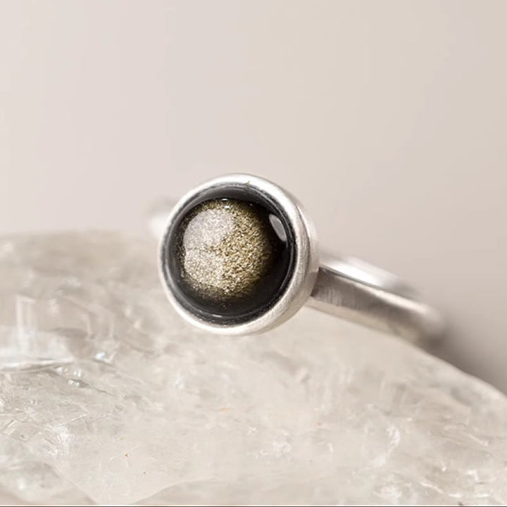 Anillo de riqueza ajustable de obsidiana con brillo dorado y plata de ley 925 natural de Buddha Stones