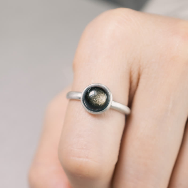 Anillo de riqueza ajustable de obsidiana con brillo dorado y plata de ley 925 natural de Buddha Stones