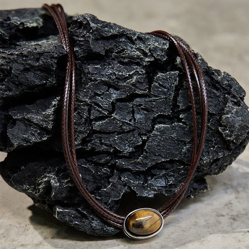 Collar con colgante de cuerda de cera con protección elíptica de ojo de tigre natural y Buddha Stones