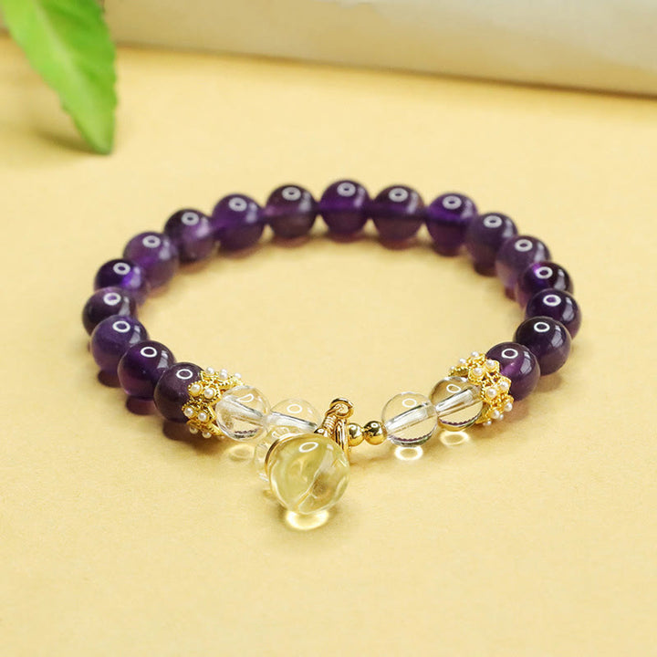 Pulsera de equilibrio con forma de bolsa de dinero de amatista y citrino natural de Buddha Stones