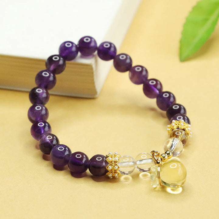 Pulsera de equilibrio con forma de bolsa de dinero de amatista y citrino natural de Buddha Stones