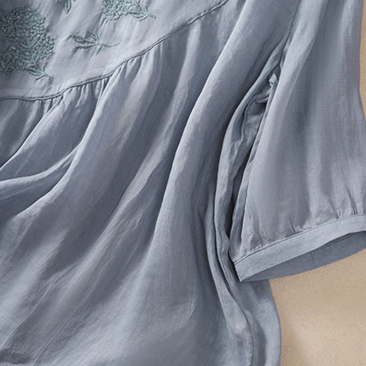 Camisa de algodón y lino de media manga para mujer con diseño floral bordado con Buddha Stones y cuello redondo