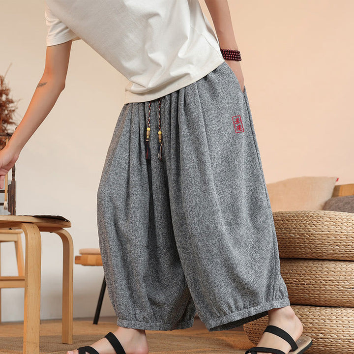Pantalones harén cortos hasta el tobillo con bordado de personajes de verano de Buddha Stones y cordón ajustable para hombre con bolsillos
