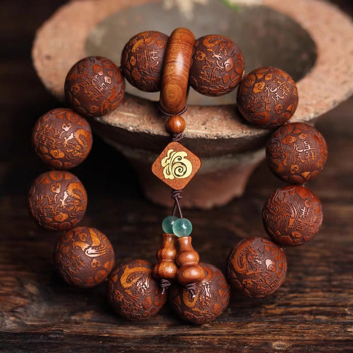 Pulsera cálida con cuentas de palisandro y calabaza con talla natural de dragón y fénix Fu