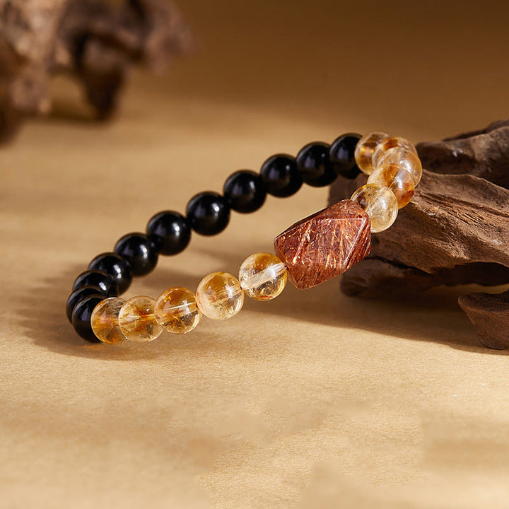 Pulsera de cristal de citrino y obsidiana negra natural de Buddha Stones con siete cristales de fuerza