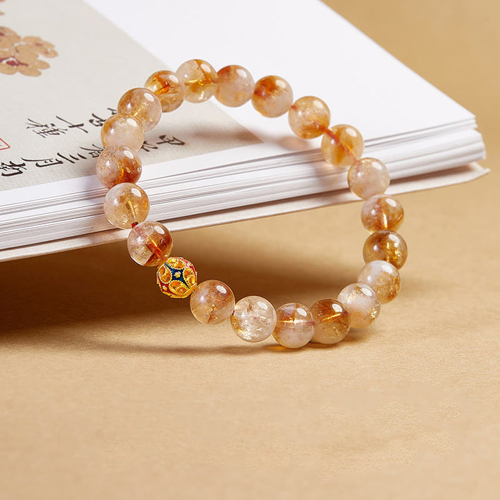 Pulsera protectora de cuentas de citrino natural con forma de flor de Buddha Stones 999