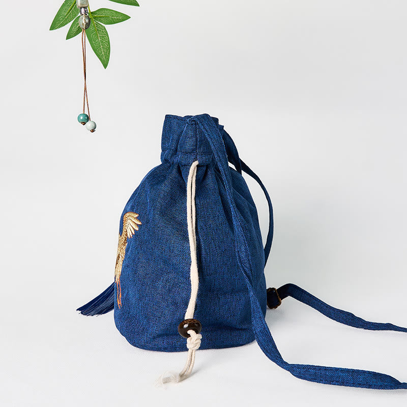 Bolso bandolera de lino y algodón con grulla azul marino bordada con Buddha Stones