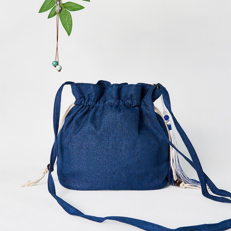 Bolso bandolera de lino y algodón con grulla azul marino bordada con Buddha Stones