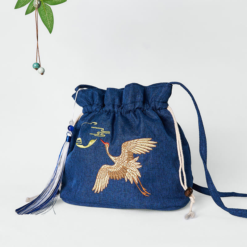 Bolso bandolera de lino y algodón con grulla azul marino bordada con Buddha Stones
