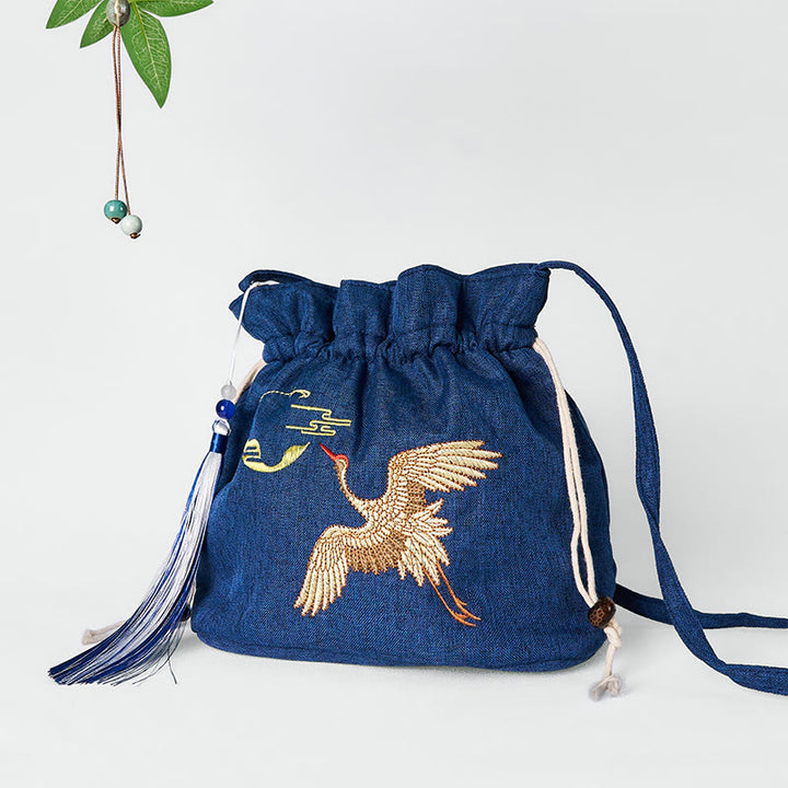 Bolso bandolera de lino y algodón con grulla azul marino bordada con Buddha Stones