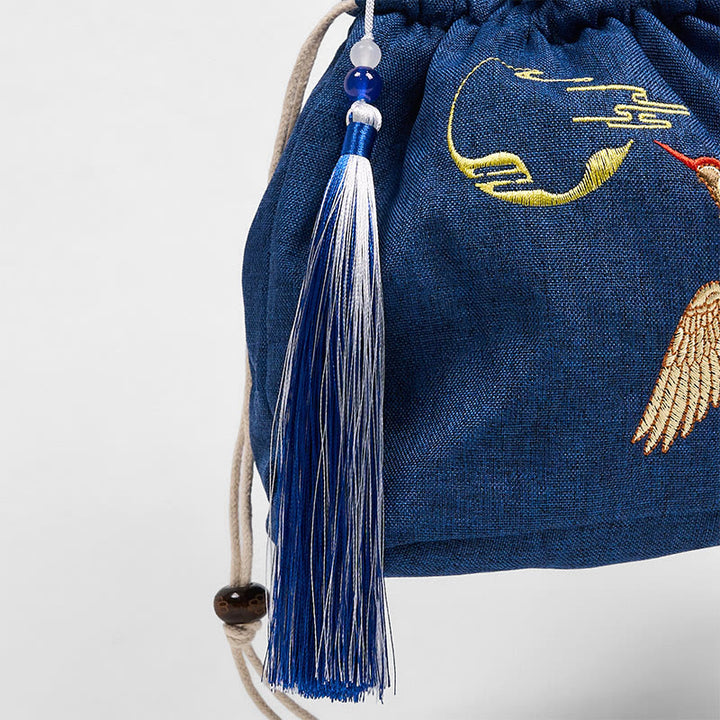 Bolso bandolera de lino y algodón con grulla azul marino bordada con Buddha Stones