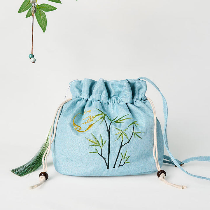 Bolso bandolera de lino y algodón de bambú verde con bordado de Buddha Stones