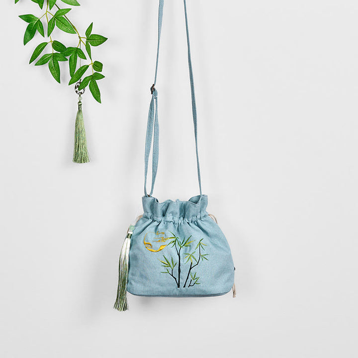 Bolso bandolera de lino y algodón de bambú verde con bordado de Buddha Stones