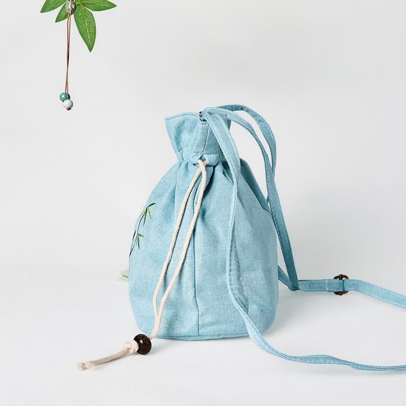 Bolso bandolera de lino y algodón de bambú verde con bordado de Buddha Stones