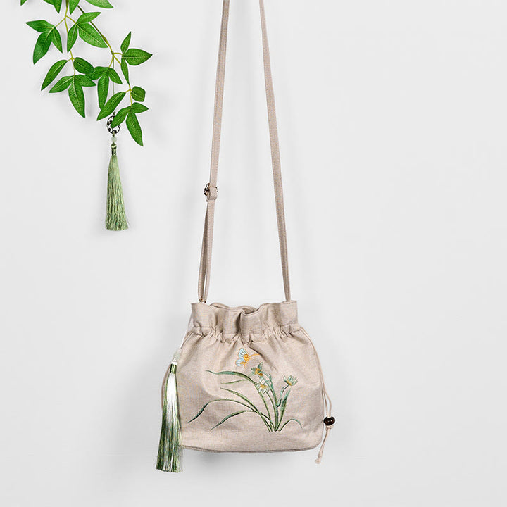 Bolso bandolera de lino y algodón con orquídea beige bordada con Buddha Stones