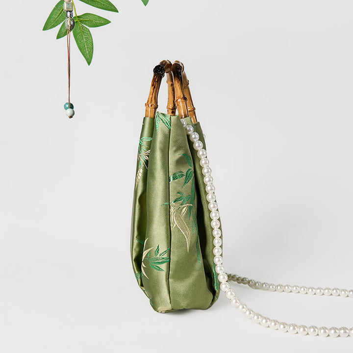 Bolso bandolera con asa de bambú y perlas, con bordado de hojas y Buddha Stones