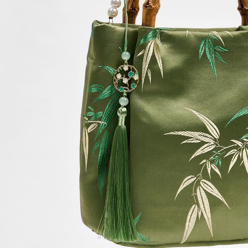 Bolso bandolera con asa de bambú y perlas, con bordado de hojas y Buddha Stones