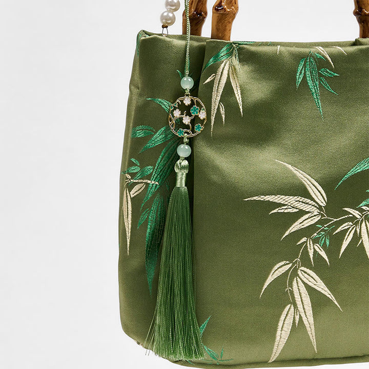 Bolso bandolera con asa de bambú y perlas, con bordado de hojas y Buddha Stones