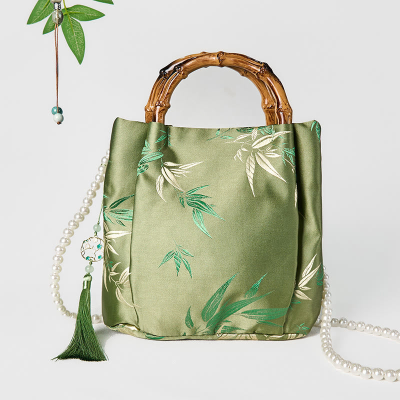 Bolso bandolera con asa de bambú y perlas, con bordado de hojas y Buddha Stones