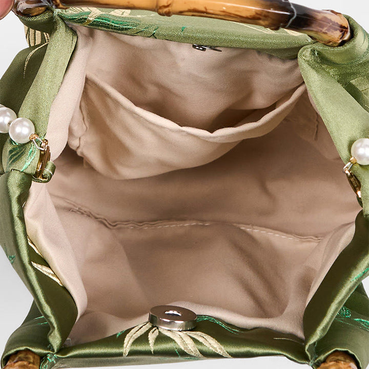 Bolso bandolera con asa de bambú y perlas, con bordado de hojas y Buddha Stones