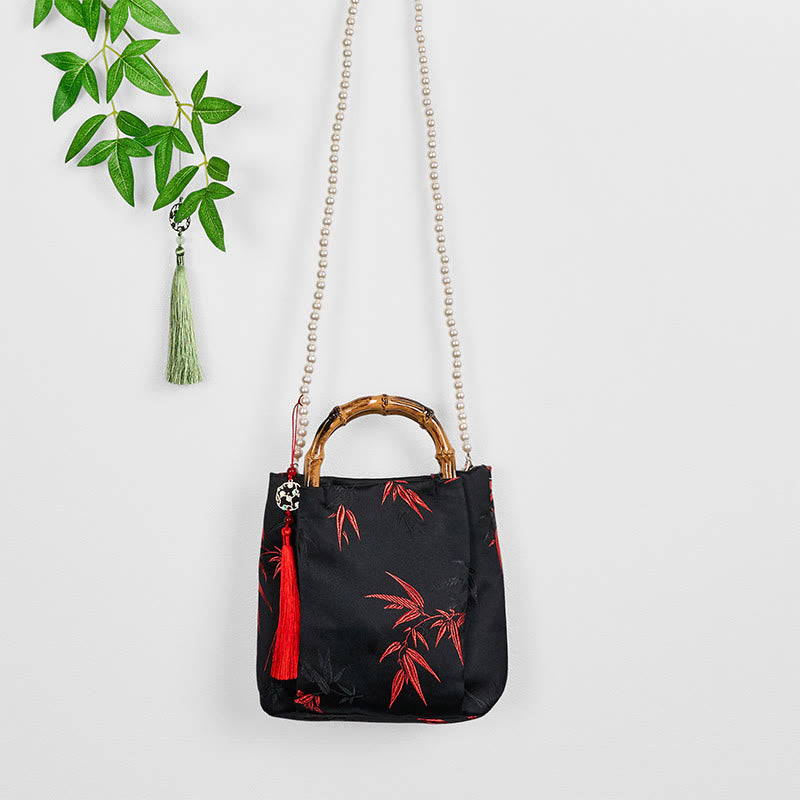 Bolso bandolera con Buddha Stones y asa de bambú y perlas.