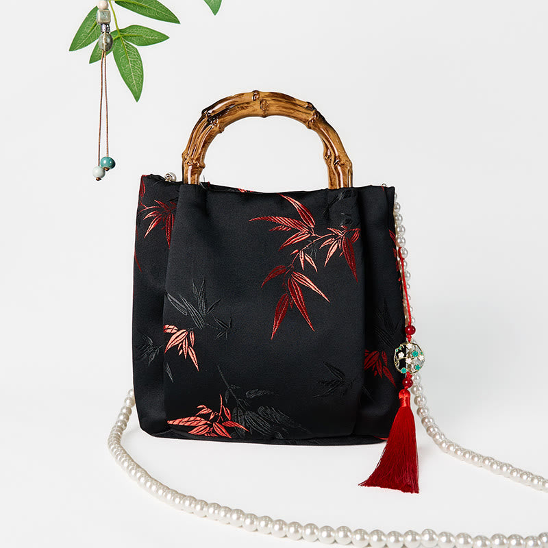 Bolso bandolera con Buddha Stones y asa de bambú y perlas.