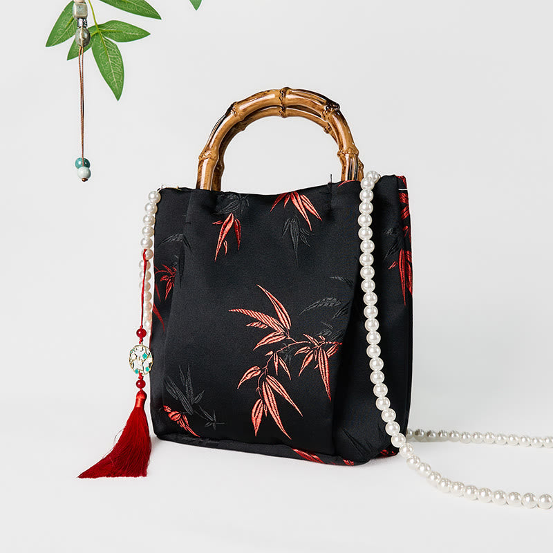 Bolso bandolera con Buddha Stones y asa de bambú y perlas.