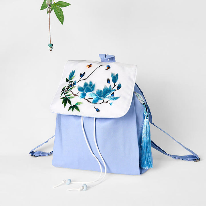 Mochila de lona de gran capacidad con bordado de magnolia azul hecha a mano con Buddha Stones