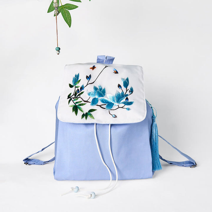 Mochila de lona de gran capacidad con bordado de magnolia azul hecha a mano con Buddha Stones