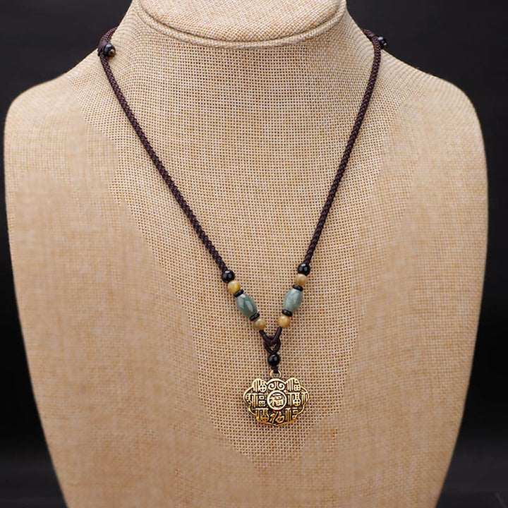 Buddha Stones Collar con colgante de cuerda de cobre y latón con el símbolo de la suerte y la fortuna. - image 1