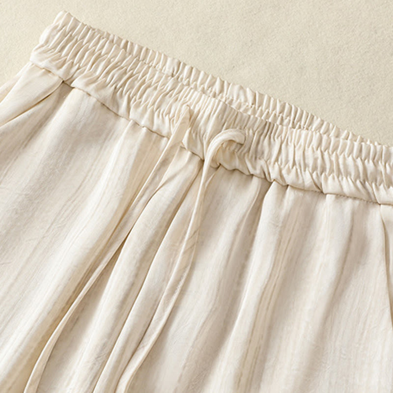 Pantalones casuales con cordón ajustable y bolsillos para mujer, con diseño artístico de líneas verticales y Buddha Stones. - image 2