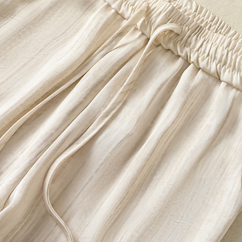 Pantalones casuales con cordón ajustable y bolsillos para mujer, con diseño artístico de líneas verticales y Buddha Stones. - image 4