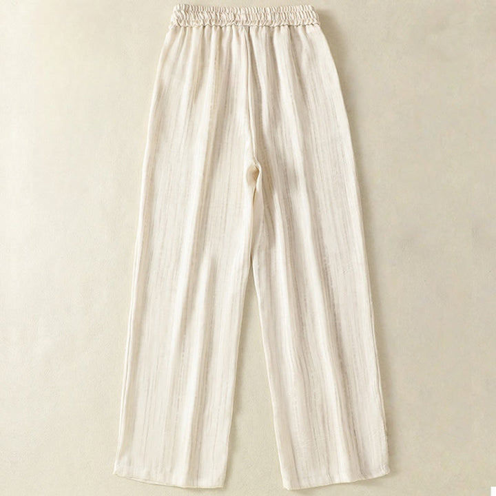 Pantalones casuales con cordón ajustable y bolsillos para mujer, con diseño artístico de líneas verticales y Buddha Stones. - image 1