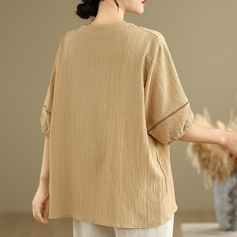 Camisa informal de poliéster de manga corta con cuello en V y botones lisos de Buddha Stones para mujer - image 1