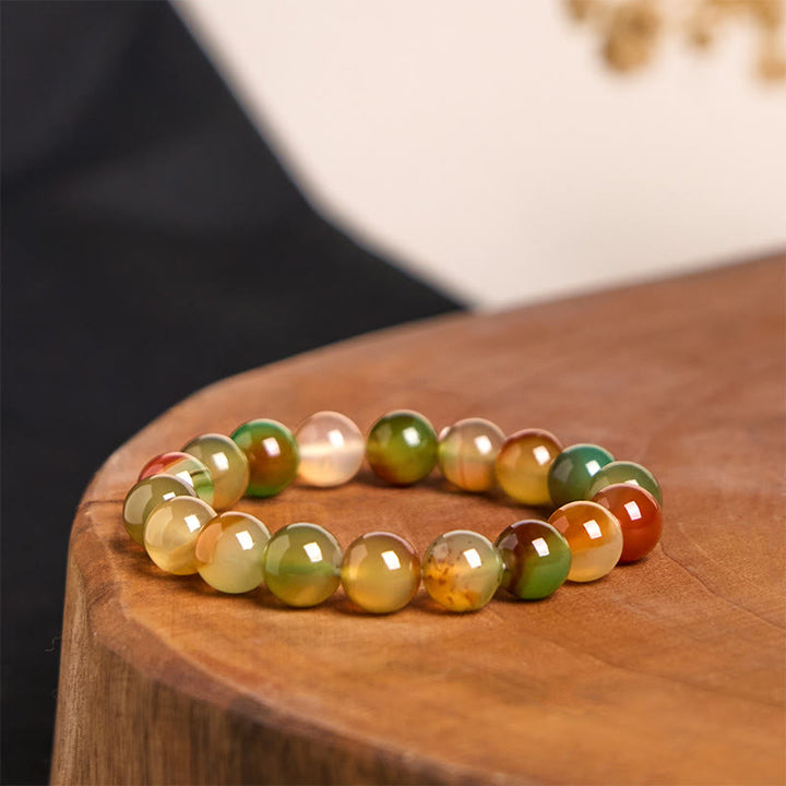 Pulsera de ágata pavo real natural y colorida con Buddha Stones para purificar el coraje