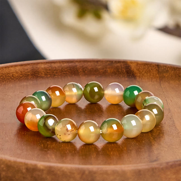 Pulsera de ágata pavo real natural y colorida con Buddha Stones para purificar el coraje