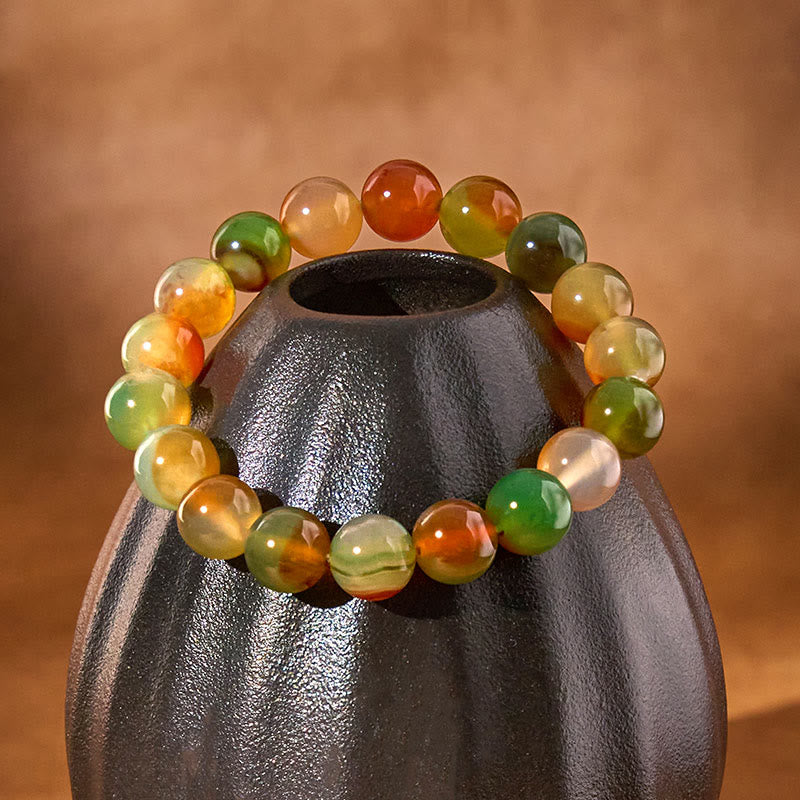 Pulsera de ágata pavo real natural y colorida con Buddha Stones para purificar el coraje