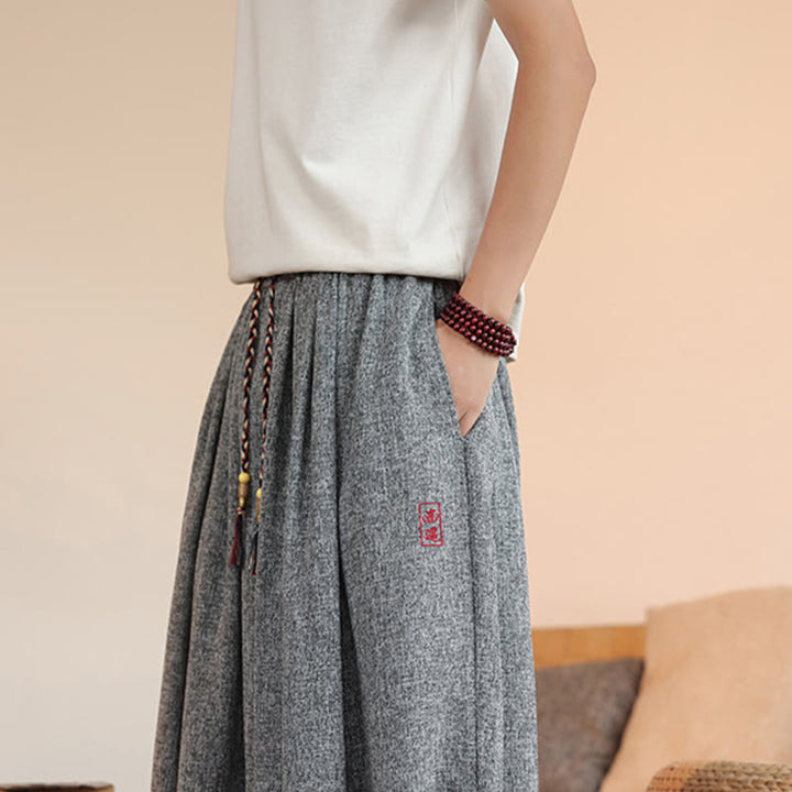 Pantalones harén cortos hasta el tobillo con bordado de personajes de verano de Buddha Stones y cordón ajustable para hombre con bolsillos