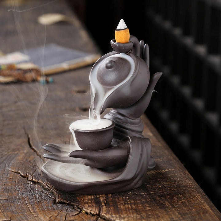 Buddha Stones , mano de Buda sosteniendo una tetera, taza, fuente de humo de cerámica con reflujo, quemador de incienso curativo, decoración - Marrón Negro 13,7*9*13,9cm - image 0