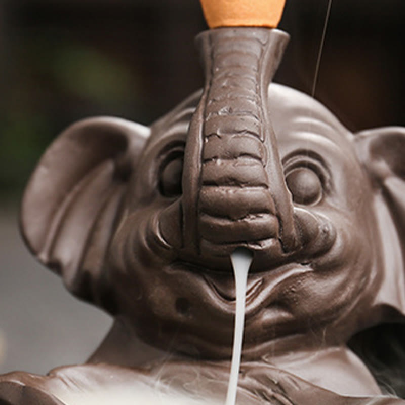 Quemador de incienso curativo con fuente de humo de reflujo de arcilla morada con diseño de elefante pequeño sosteniendo una Buddha Stones - image 11