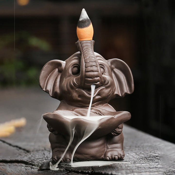 Quemador de incienso curativo con fuente de humo de reflujo de arcilla morada con diseño de elefante pequeño sosteniendo una Buddha Stones - image 8