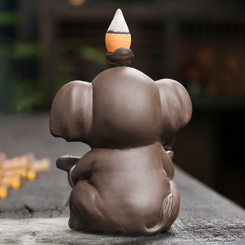 Quemador de incienso curativo con fuente de humo de reflujo de arcilla morada con diseño de elefante pequeño sosteniendo una Buddha Stones - image 5