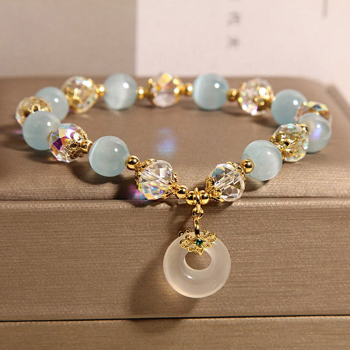 Pulsera de equilibrio con hebilla de paz y cristal blanco de ojo de gato azul y Buddha Stones - image 3