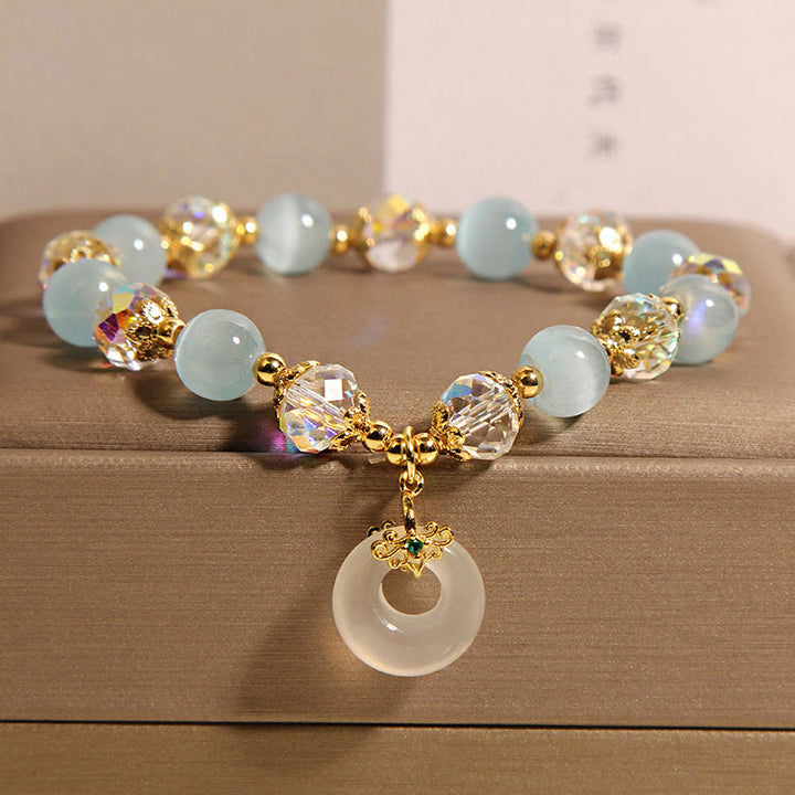 Pulsera de equilibrio con hebilla de paz y cristal blanco de ojo de gato azul y Buddha Stones - Ojo de gato azul (circunferencia de la muñeca: 15-19 cm) - image 1