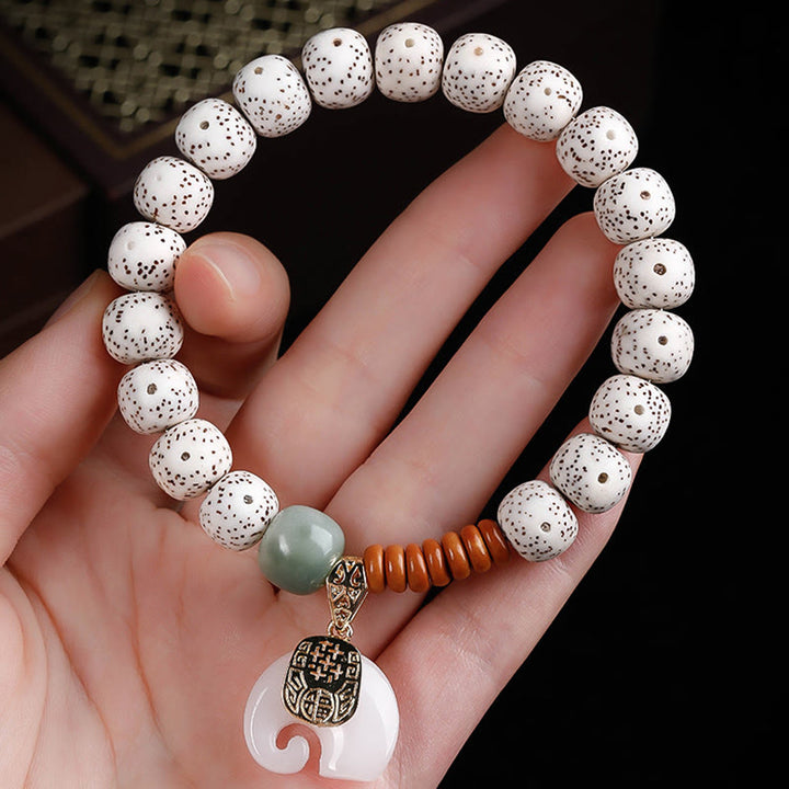 Pulsera de paz interior con Buddha Stones pulidas a mano, estrella, luna, semilla de Bodhi y patrón de elefante - image 4