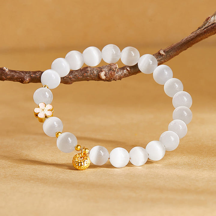 Pulsera de la suerte con ojo de gato blanco y flor de melocotón de plata de ley 925 con Buddha Stones - image 2