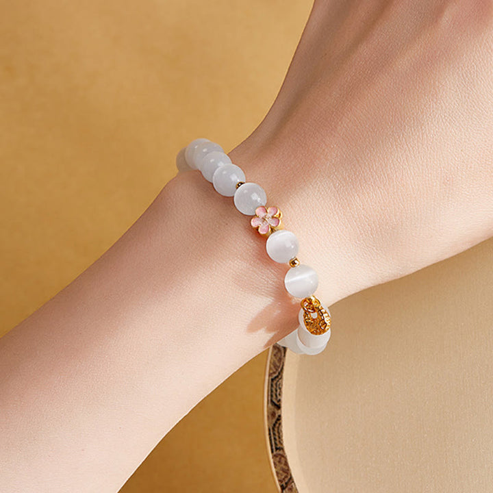 Pulsera de la suerte con ojo de gato blanco y flor de melocotón de plata de ley 925 con Buddha Stones - image 12