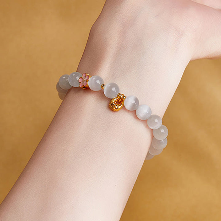 Pulsera de la suerte con ojo de gato blanco y flor de melocotón de plata de ley 925 con Buddha Stones - image 11