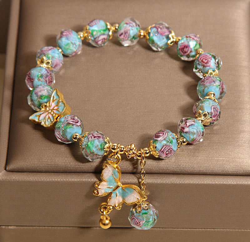 Pulsera Liuli con dije de mariposa y flor rosa de Buddha Stones - image 4